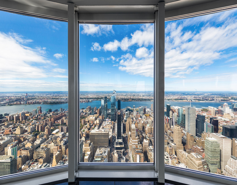 A view from the 102nd floor observatory of the Empire State Building. The view is of the New York City skyline.